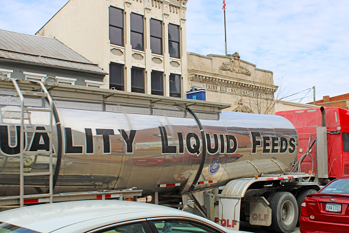 Lancaster, Ohio USA - tanker truck driving through downtown in traffic