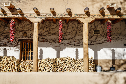 Traditional dried red chili ristras at a house in Santa Fe, New Mexico