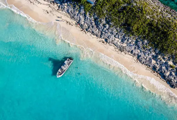 Photo of The drone aerial view of the beach of Rose Island, Bahamas.