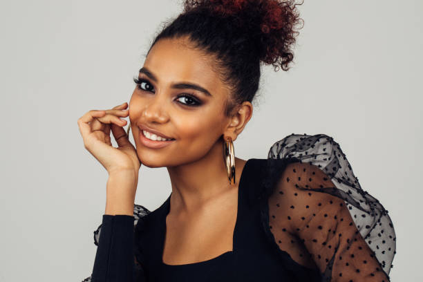 istock Beautiful afro woman with perfect make-up 1395212473