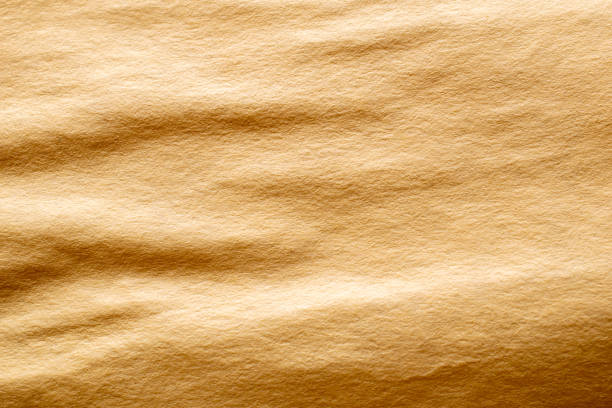 istock old wrinkled yellowed paper for vintage background 1395212638