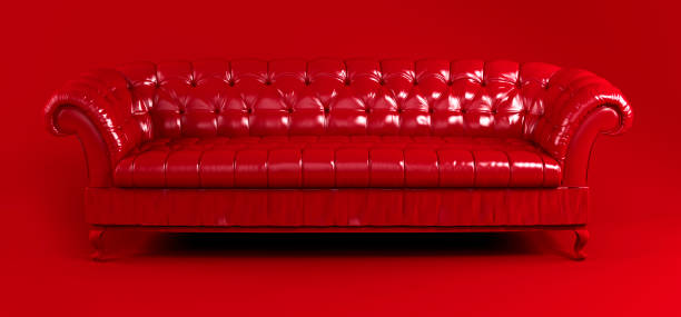 istock Red quilted leather sofa on red background front view. Creative concept of minimalistic interior, stylish vintage chester sofa. Single piece of furniture. Bright luxury red couch 1395214696