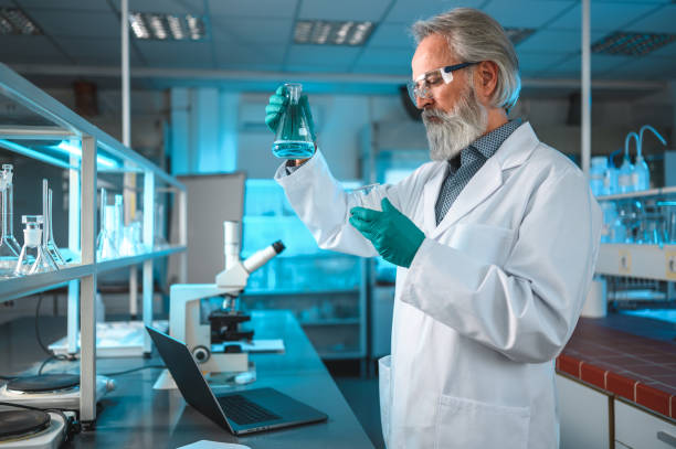 istock Mature Male Scientist with Test Results 1395215313