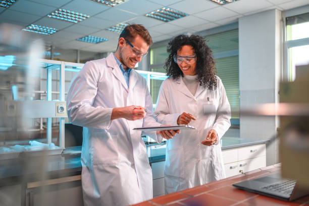 istock Female and Male Team in a Laboratory 1395216176