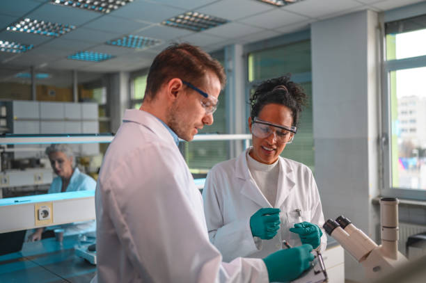 istock Mixed Team of Fresh Pharmacists at the Lab 1395216180