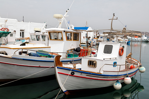 Fishing boats in the harbour of Paros, Aegean Sea, Cyclades, Greece.