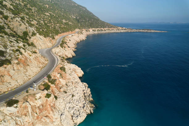 Seaside road approaching a beach, seen from above