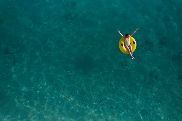 istock Happy sunny day at beach on summer 1395223084