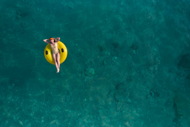 istock Happy sunny day at beach on summer 1395223089