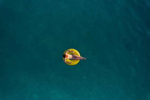 istock Happy sunny day at beach on summer 1395223100