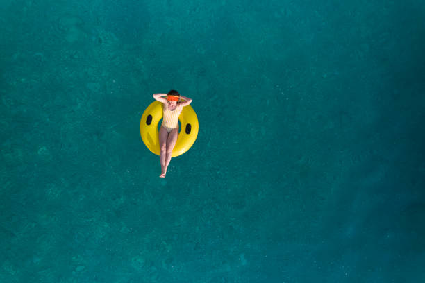 istock Happy sunny day at beach on summer 1395223112