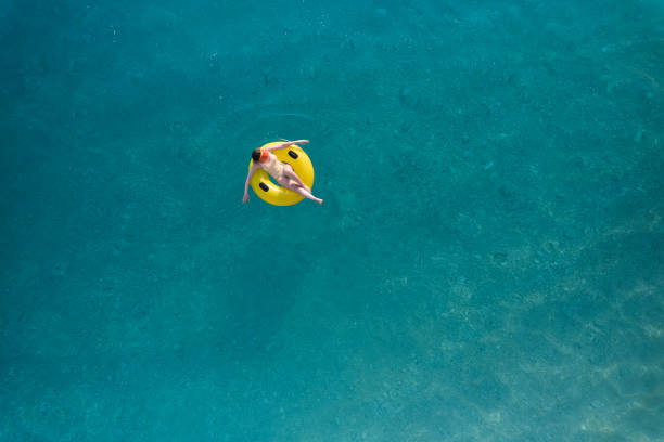 istock Happy sunny day at beach on summer 1395223121