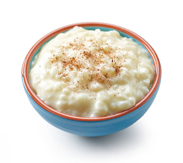 tazón de arroz y leche con leche - rice pudding fotografías e imágenes de stock