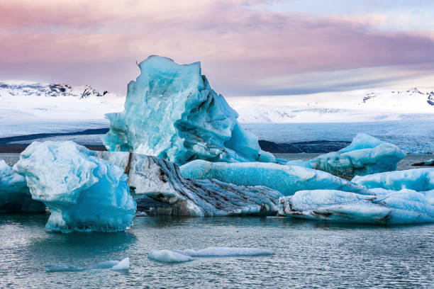 istock Icebergs in a spectacular glacial lagoon at sunset (Jokusarlon, Iceland) 1395231004