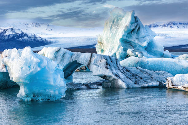 istock Icebergs in a spectacular glacial lagoon at sunset (Jokusarlon, Iceland) 1395231038
