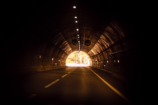 The Marão Tunnel is a road tunnel located in Portugal that connects Amarante with Vila Real, crossing the Serra do Marão. - Hope concept, the light at the end of the tunnel.