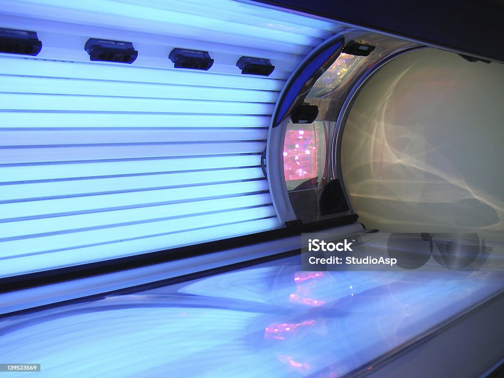 Luminous solarium Open and luminous solarium Tanning Bed Stock Photo