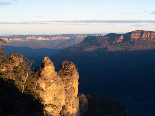 istock Sunrise at The Tree Sisters rock formation 1395235816