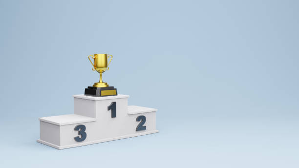 istock winner podium with Gold Trophy Cup 3d rendering 1395238191