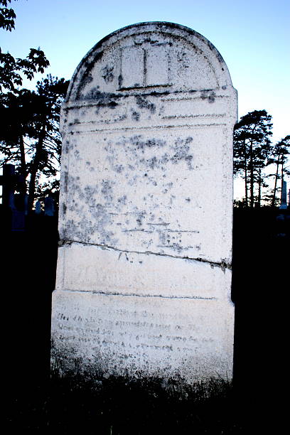 blank cracked tombstone stock photo