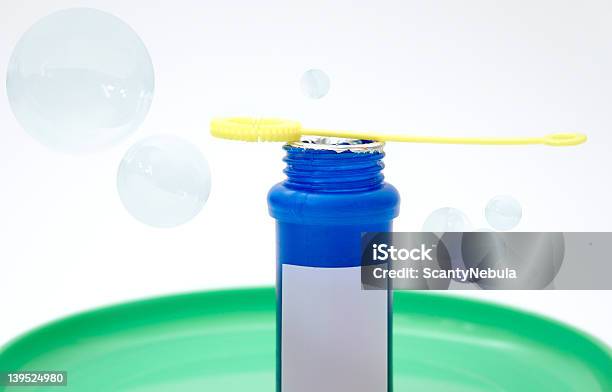 Blowing Bubbles Stock Photo - Download Image Now - Air Pump, Blowing, Bottle