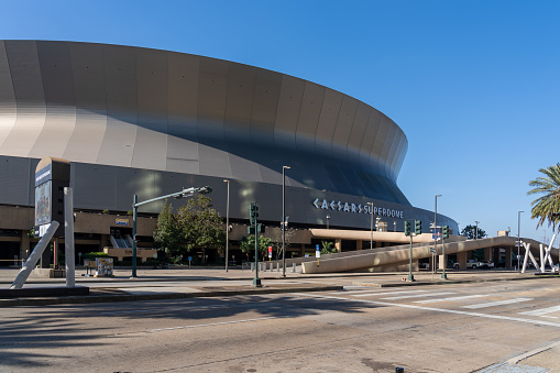 New Orleans, Louisiana, USA - February 12, 2022: Caesars Superdome sign on the building in New Orleans, Louisiana, USA. Caesars Superdome is a multi-purpose stadium.