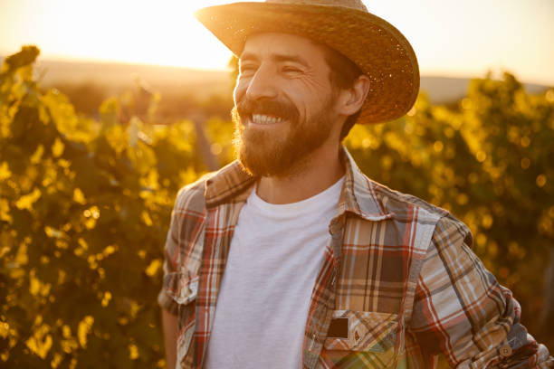 istock Cheerful male farmer in vineyard 1395253622