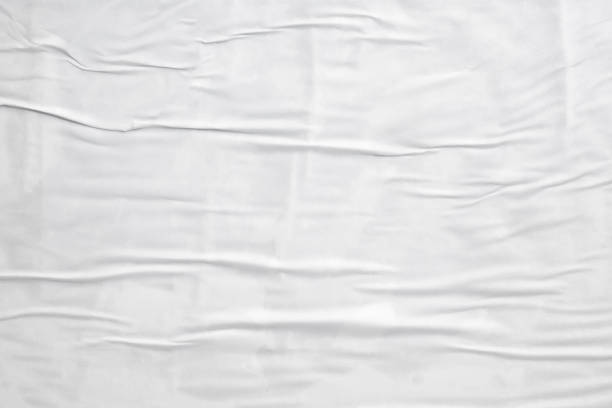 istock white crumpled and creased paper poster texture background 1395253972