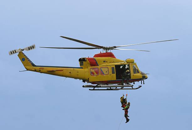 rescue by helicopter stock photo