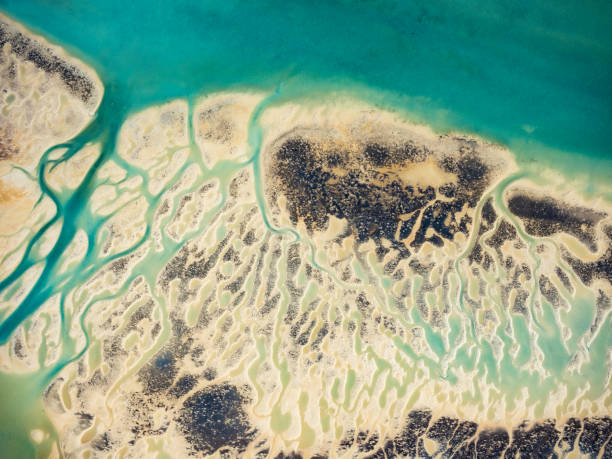 istock Aerial view of water and sand patterns 1395256844