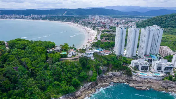 Aerial view of Enseada beach in Guarujá, Brazil. rocks and blue sea on the coast