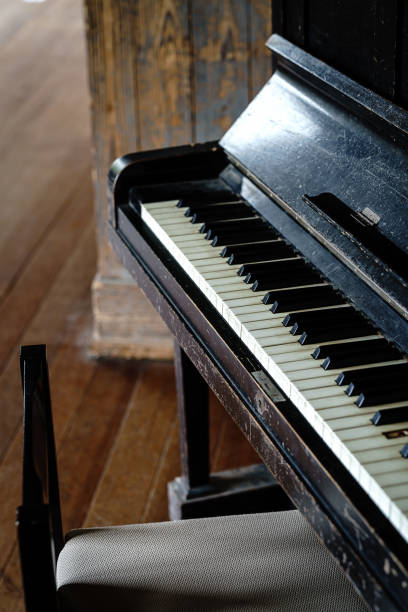 istock Old piano on abandoned Japanese elementary school 1395263840