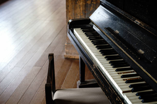istock Old piano on abandoned Japanese elementary school 1395263845