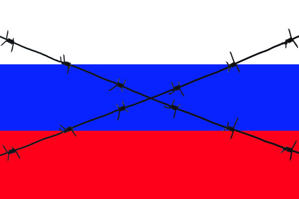 istock Russian flag crossed with barbed wire. 1395264441