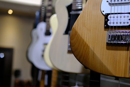 Guitars on display in music instruments store