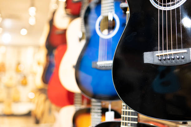 istock Guitars on display in music instruments store in a mall 1395266149