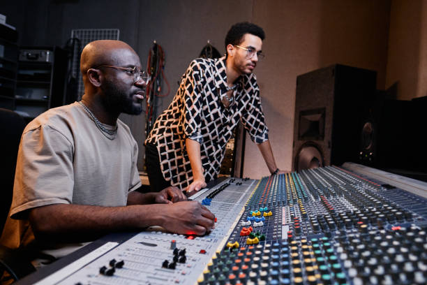 istock Two People Working On Album 1395271097