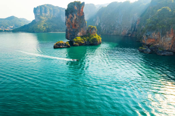 istock Sea views and rocky islands with a long-tail boat. 1395273058