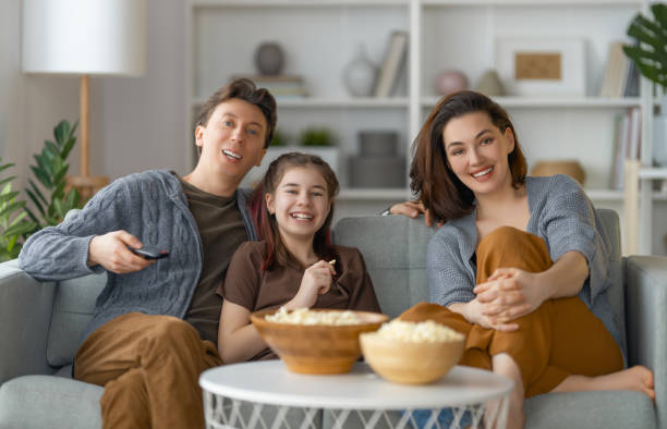 istock Mother, father and daughter spending time together. 1395274620