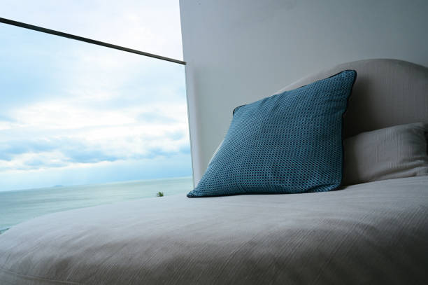 istock blue pillow on balcony with sky and sea 1395275597