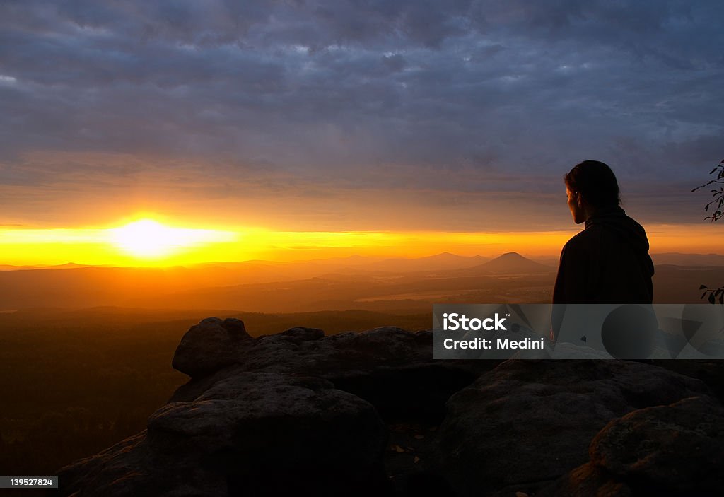 Future Girl watching sunrise. Hope - Concept Stock Photo