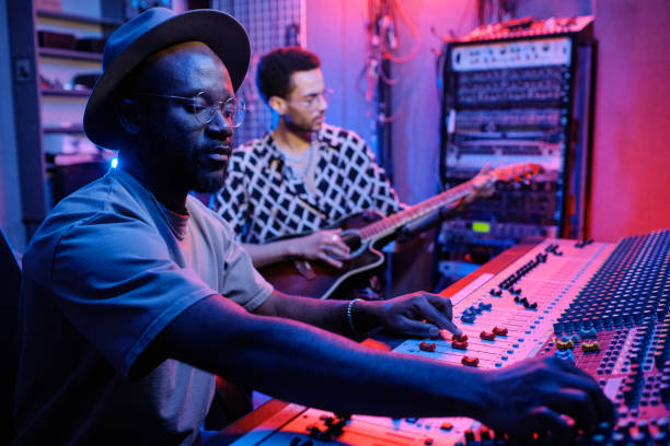 istock Two Male Musicians In Studio 1395278523