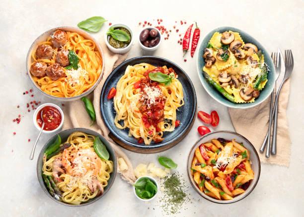 istock Italian pasta assortment on light background. 1395278658