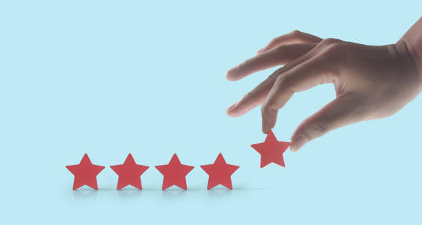 istock Rise on increasing five stars in human hand 1395278896