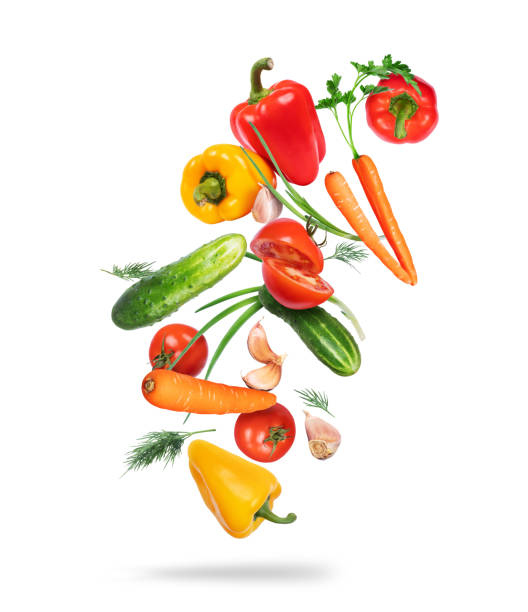 istock Various vegetables in the air on a white background 1395278922