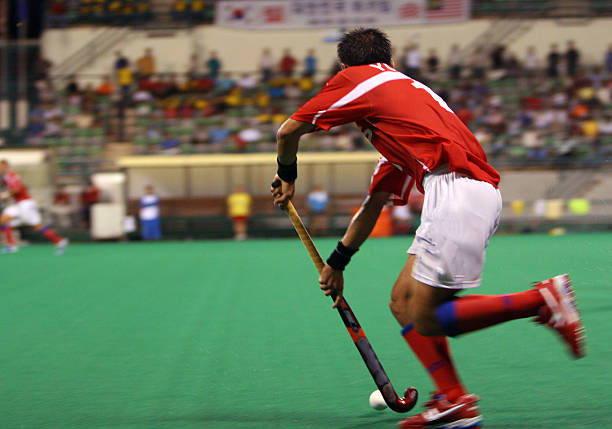 istock Field hockey player in stadium in action 139528001