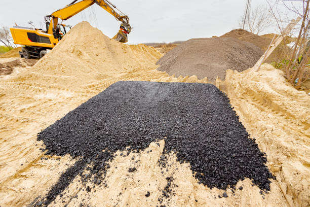 istock A layer of fresh and hot, asphalt on the sand 1395282722