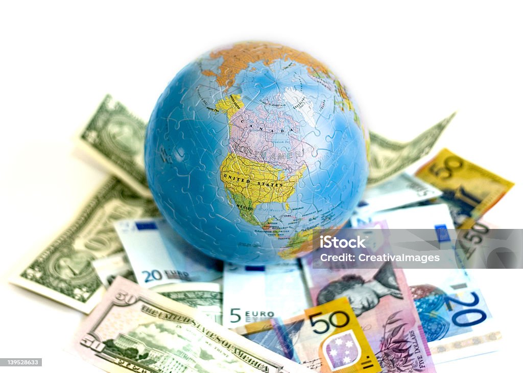 Globe 3D Puzzle with Euro, US Dollars, and AUS Dollars Architectural Dome Stock Photo