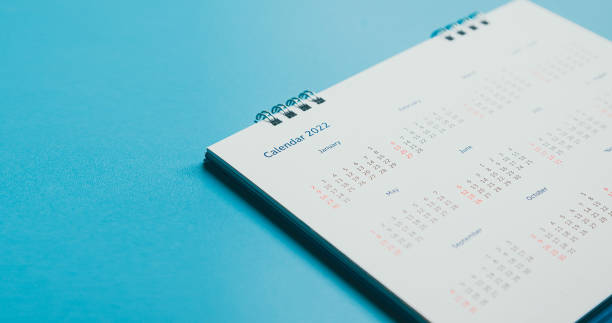 istock Close top view on white calendar 2022 month schedule Work planning and life concept. 1395291222