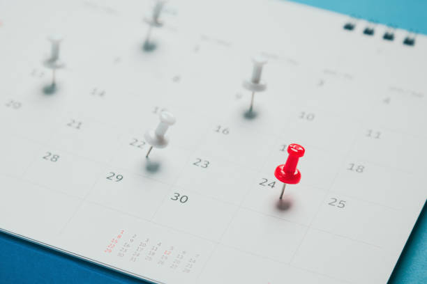 istock Close top view on white calendar 2022 month schedule Work planning and life concept. 1395291244